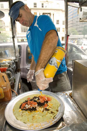 John makes a burrito with his goose sauce